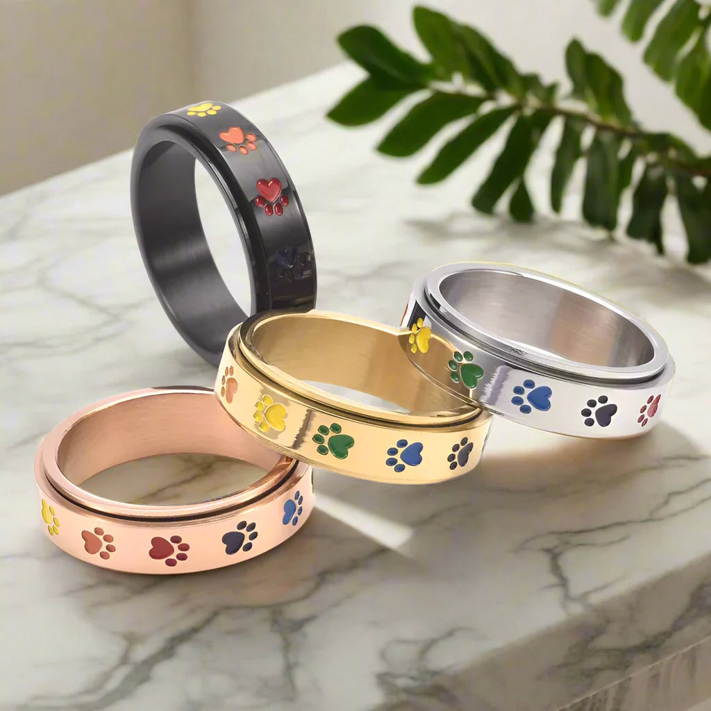 Spinning Stress Reducing Paw Ring – Stainless Steel with Rainbow Paws